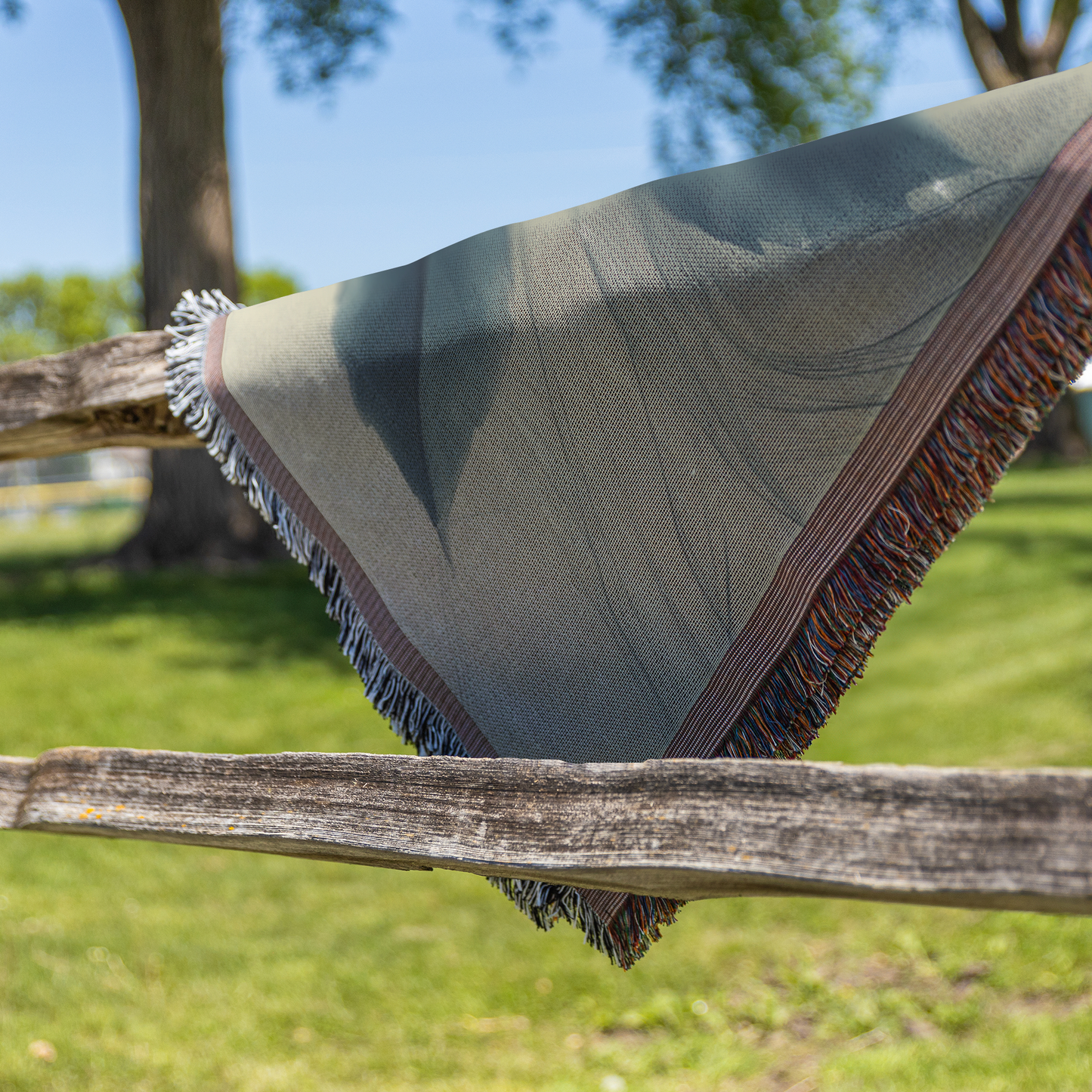 Serene_Rose_Woven_Throw_Blanket_Shimmeri_Fence_H_Mockup.png