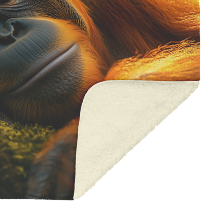 Orangutan_Resting_in_Glowing_Moss_with_G_H_Blanket_Sherpa_Mockup.png