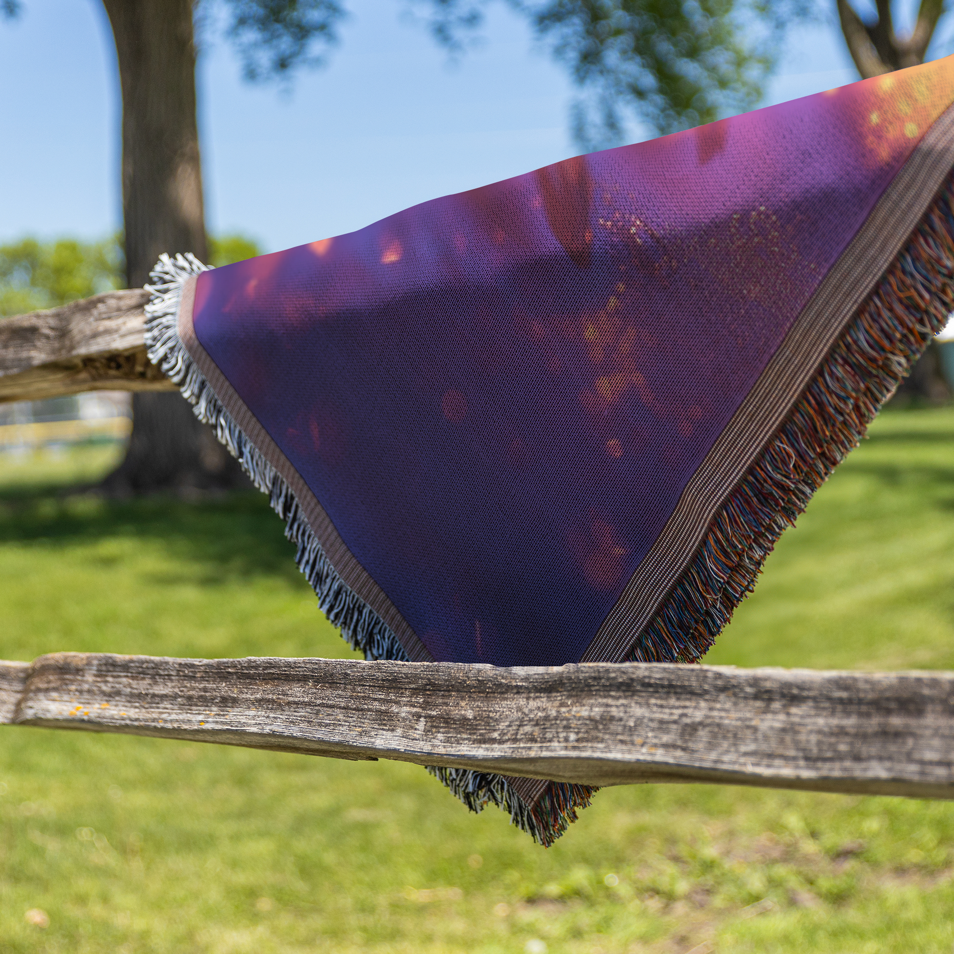 Radiant_Paw_Print_Woven_Throw_Blanket_Gl_Fence_H_Mockup.png