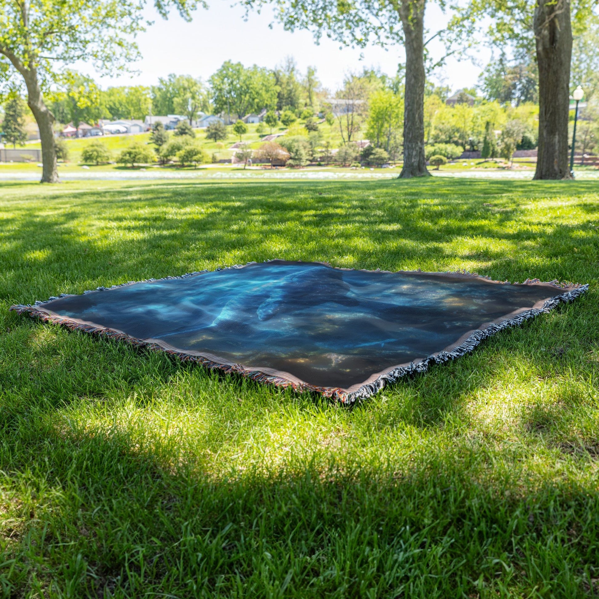 Blue Whale Resting Peacefully in Glowing Deep Sea Cave Surrounded by Bioluminescent Plants and Soft Ethereal Light Woven Throw Blanket - Awakening Righteousness