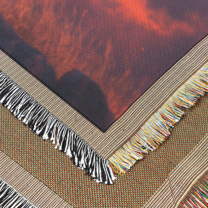 Majestic Lion on Rocky Savanna Ridge Under Glowing Red and Orange Sunset with Illuminated Golden Mane Woven Throw Blanket - Awakening Righteousness